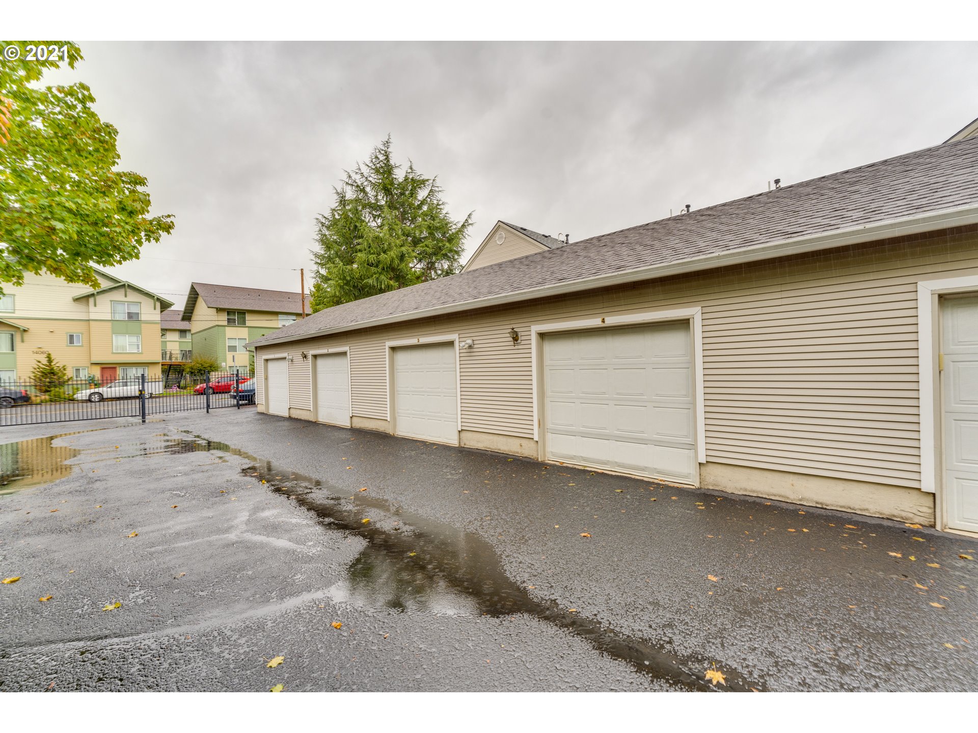 14134 East Burnside Street, Unit 4 Portland, OR 97233 - Photo 22 of 27 a view of a street with house