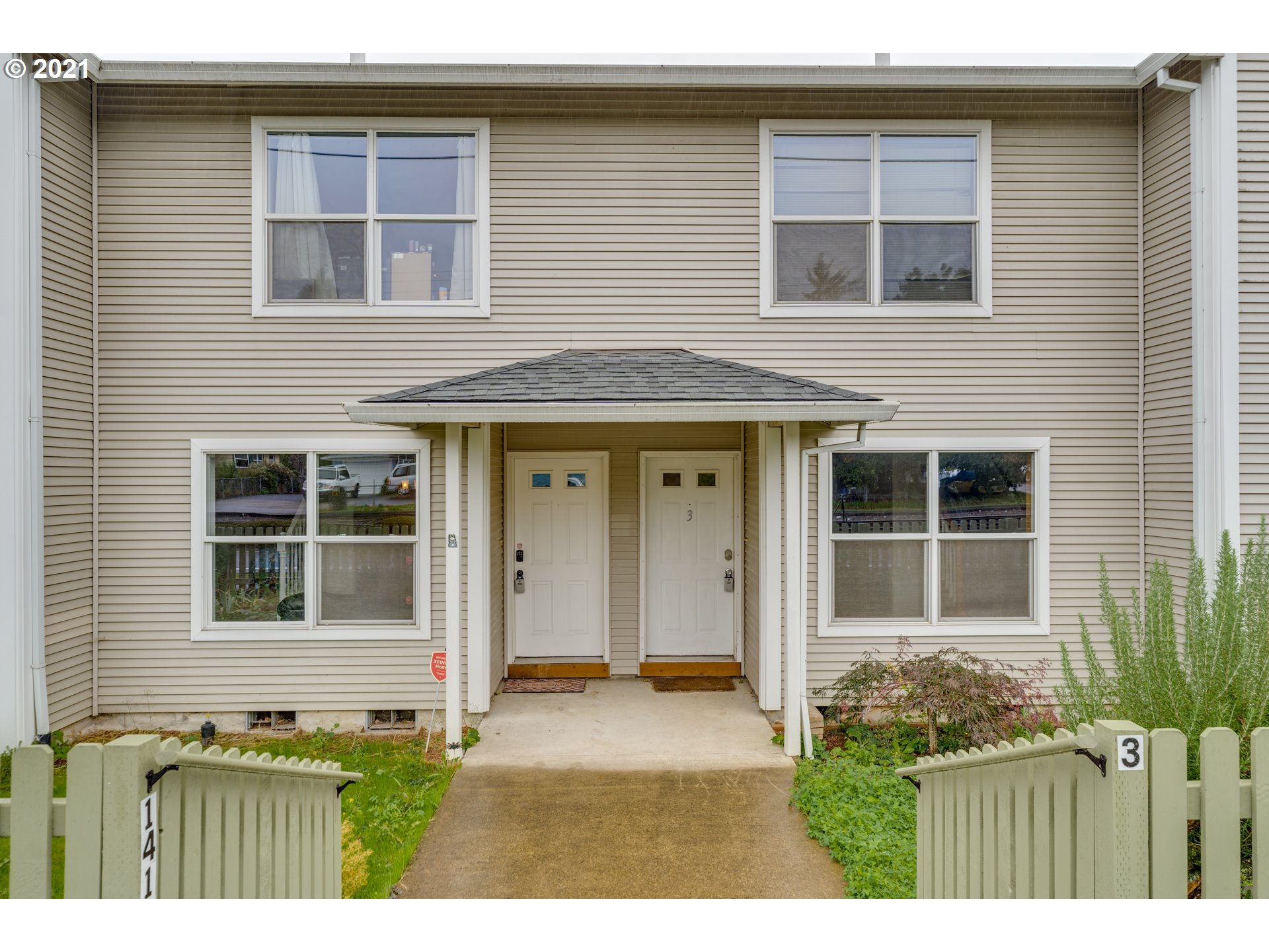 14134 East Burnside Street, Unit 4 Portland, OR 97233 - Photo 23 of 27 a view of house with front door