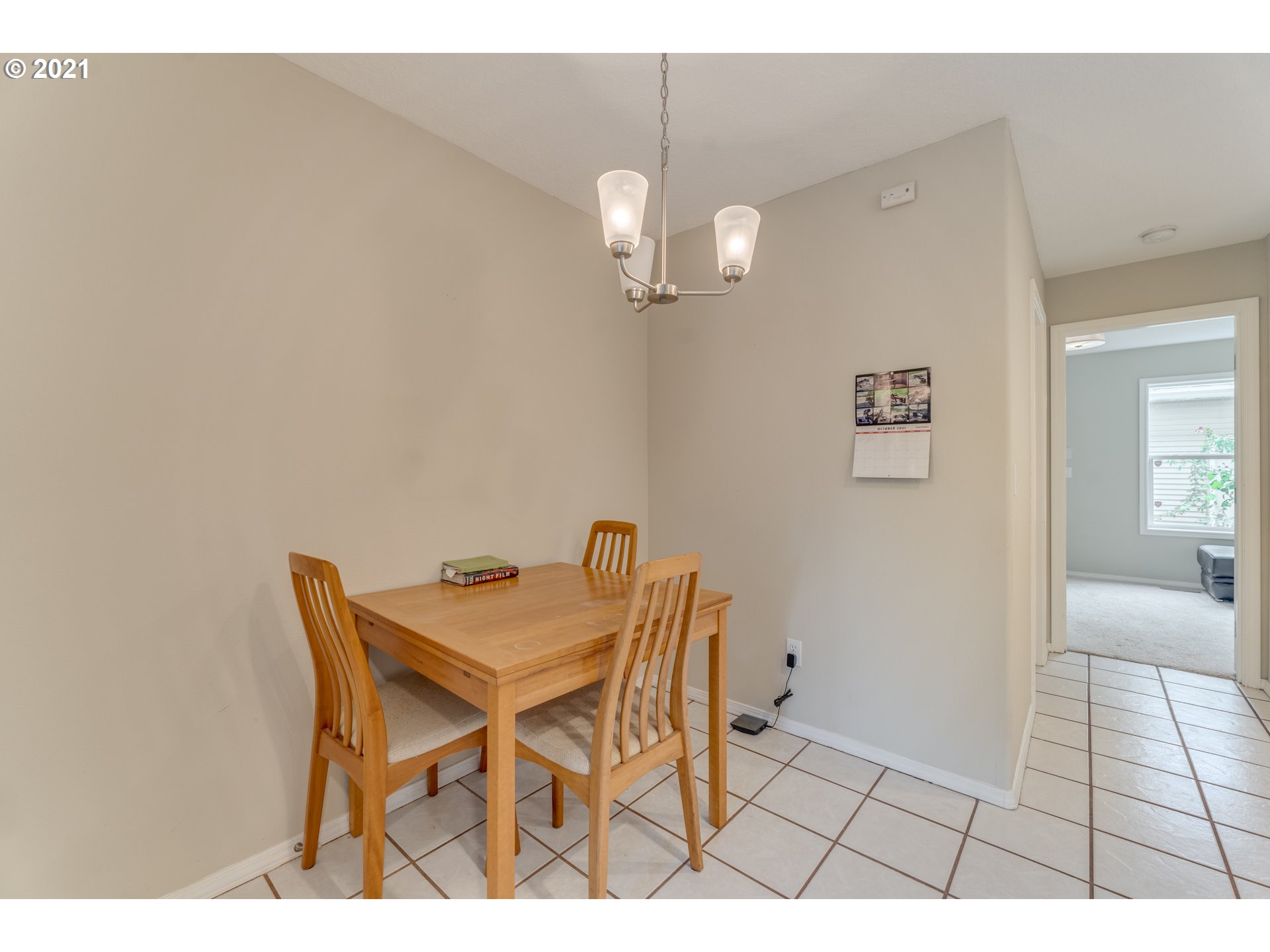 14134 East Burnside Street, Unit 4 Portland, OR 97233 - Photo 6 of 27 a dining room with a table and chairs