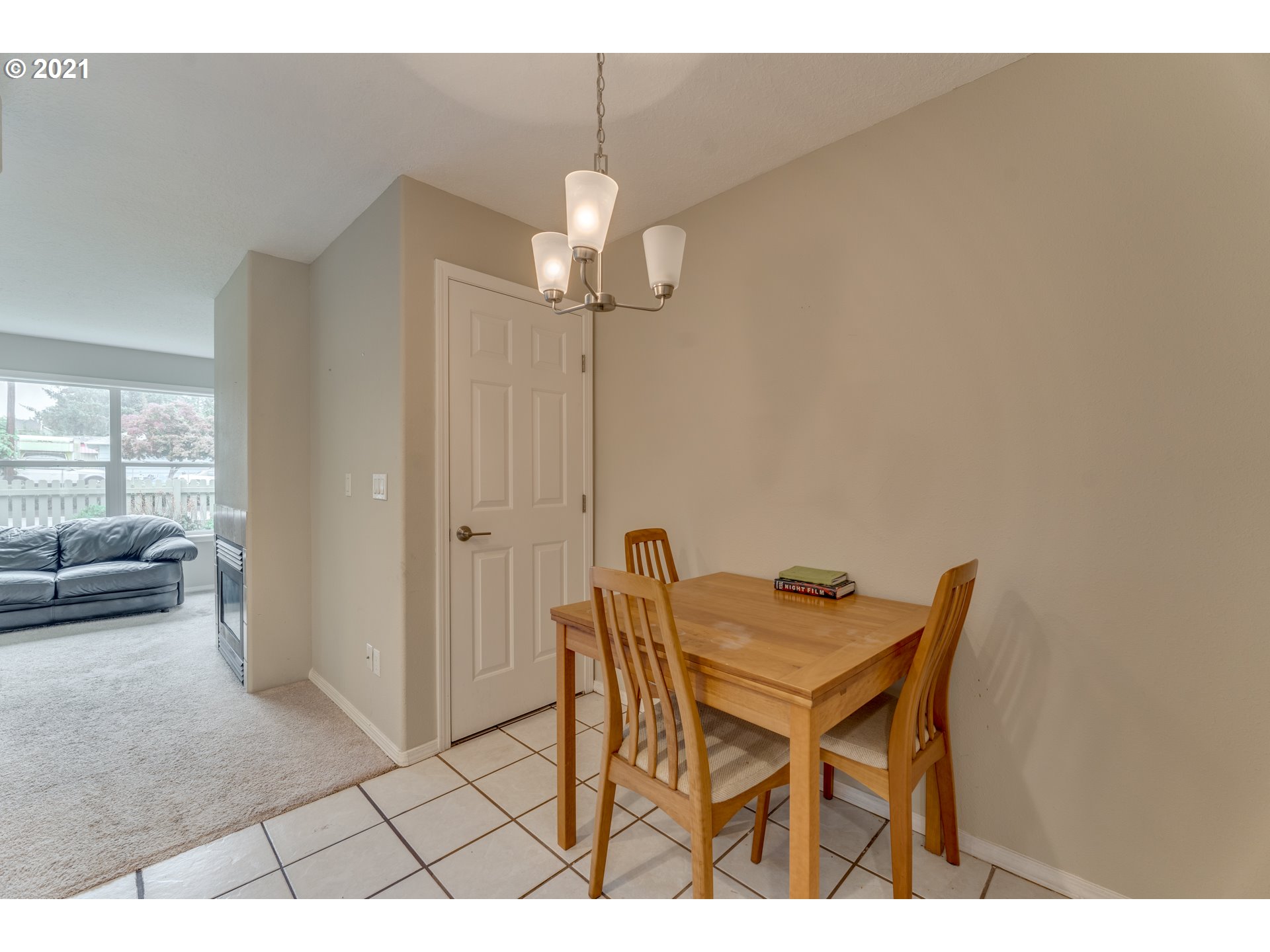 14134 East Burnside Street, Unit 4 Portland, OR 97233 - Photo 7 of 27 a view of a dining room with furniture and wooden floor