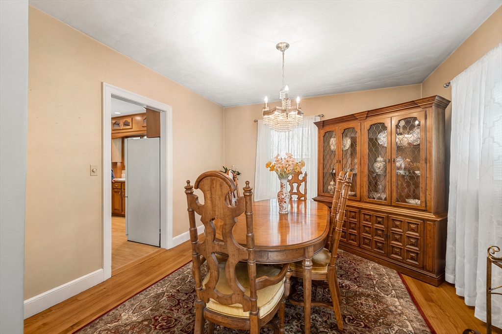 69 Morningside Road Worcester, MA 01602 - Photo 11 of 30 a view of a dining room with furniture wooden floor and chandelier