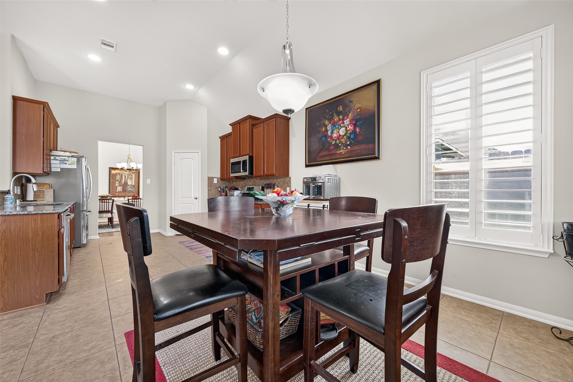 4910 Culver Lane Rosenberg, TX 77471 - Photo 31 of 50 Bright and spacious breakfast area with quick access to the kitchen so your coffee and breakfast stays hot! Large windows with plantation shutters for perfect light adjustment.