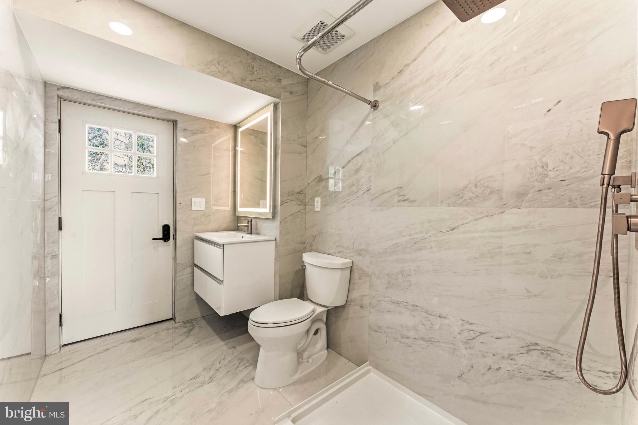 3750 Wheatsheaf Road Huntingdon Valley, PA 19006 - Photo 17 of 45 a bathroom with a toilet and a shower