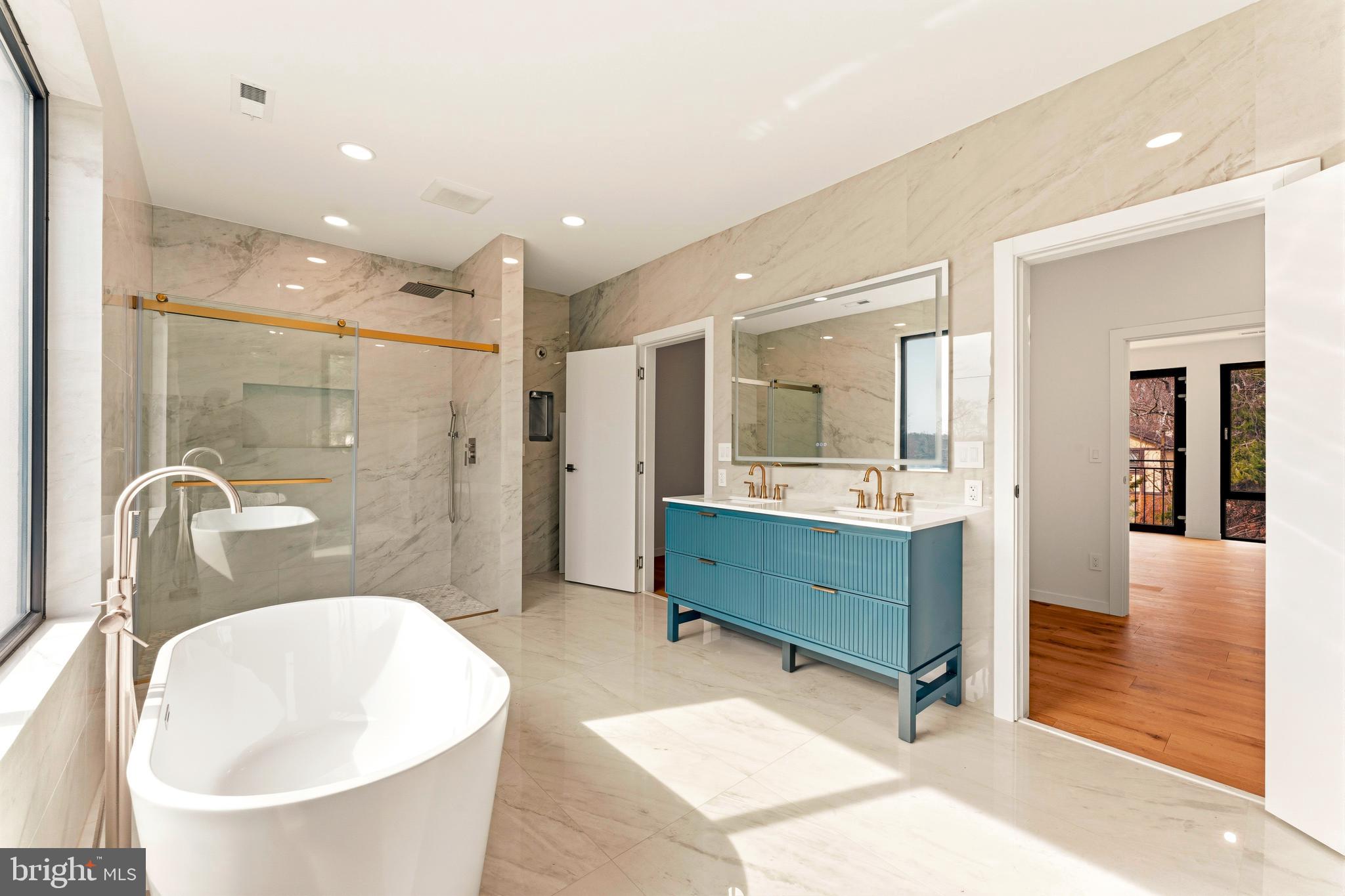 3750 Wheatsheaf Road Huntingdon Valley, PA 19006 - Photo 22 of 45 a bathroom with a double vanity sink mirror and bathtub