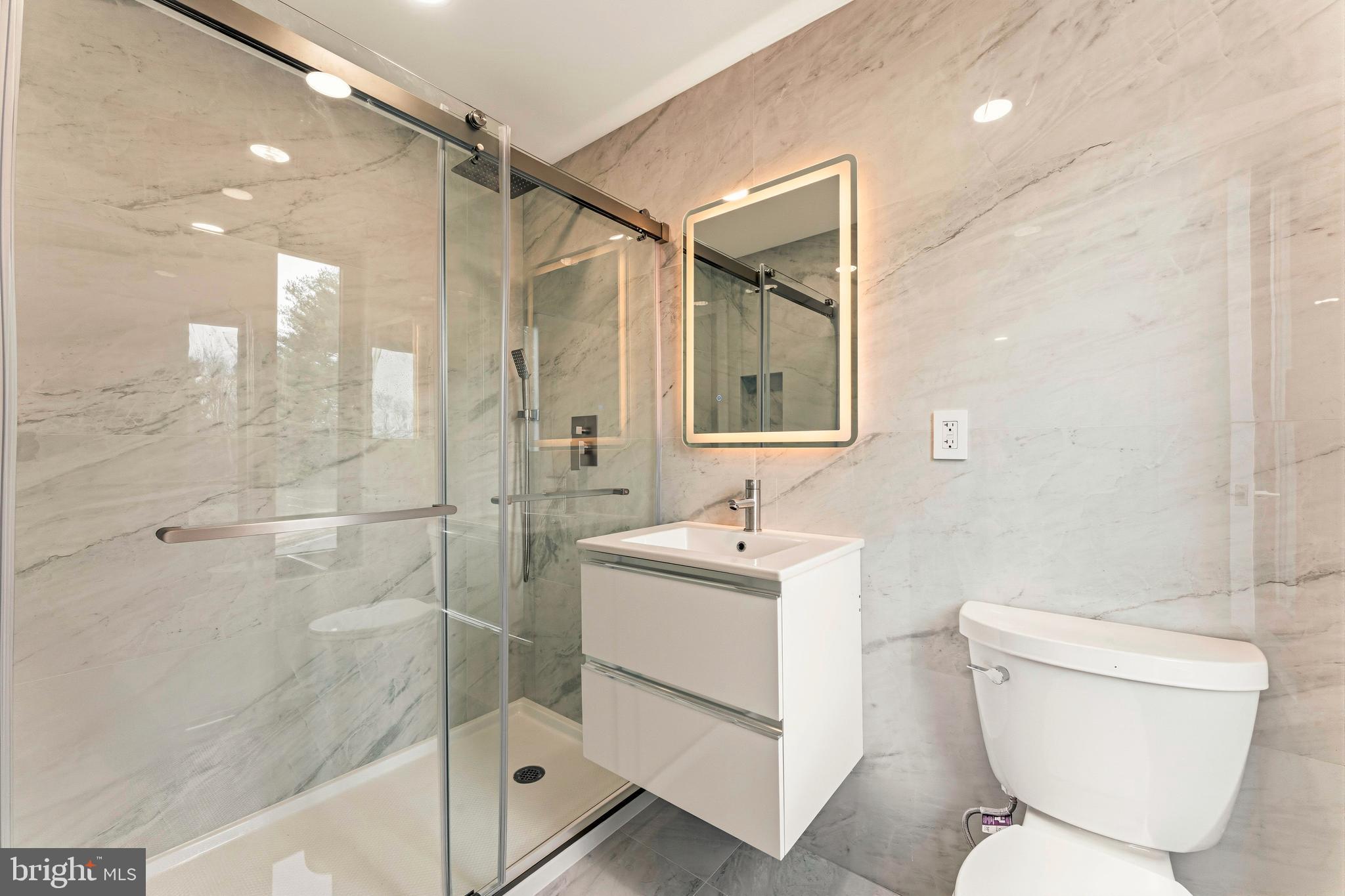 3750 Wheatsheaf Road Huntingdon Valley, PA 19006 - Photo 29 of 45 a bathroom with a toilet sink and shower