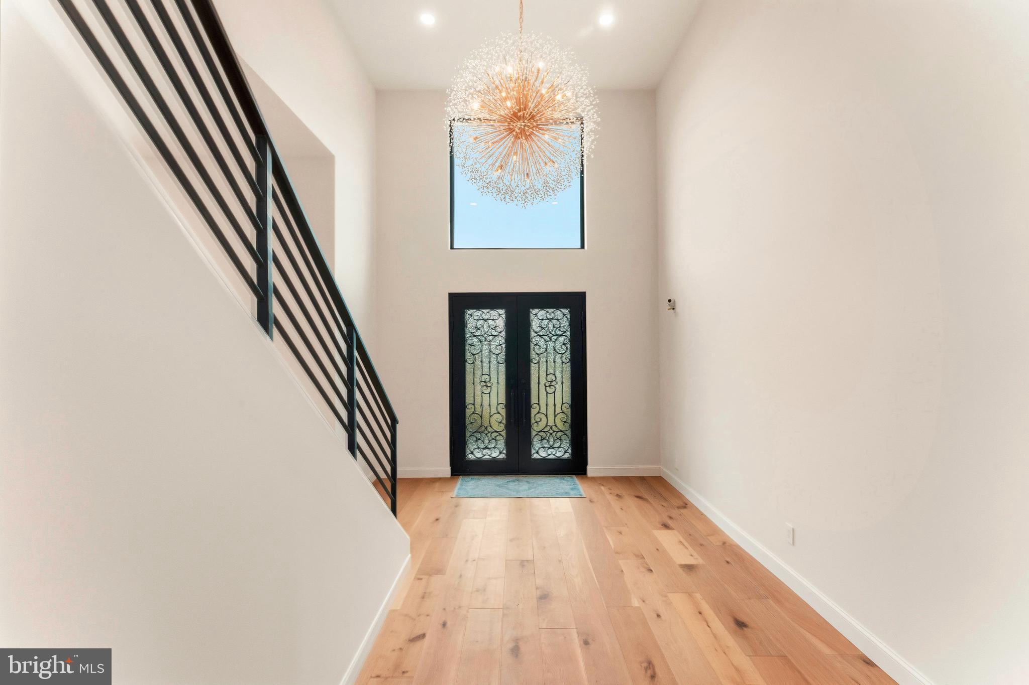 3750 Wheatsheaf Road Huntingdon Valley, PA 19006 - Photo 6 of 45 wooden floor in an empty room with a window