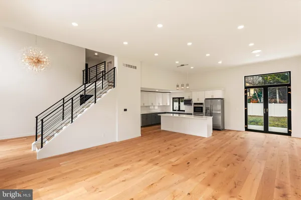 a view of kitchen with microwave and furniture