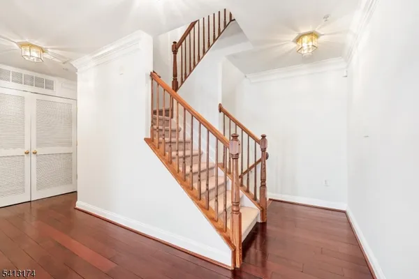 a view of entryway with wooden floor