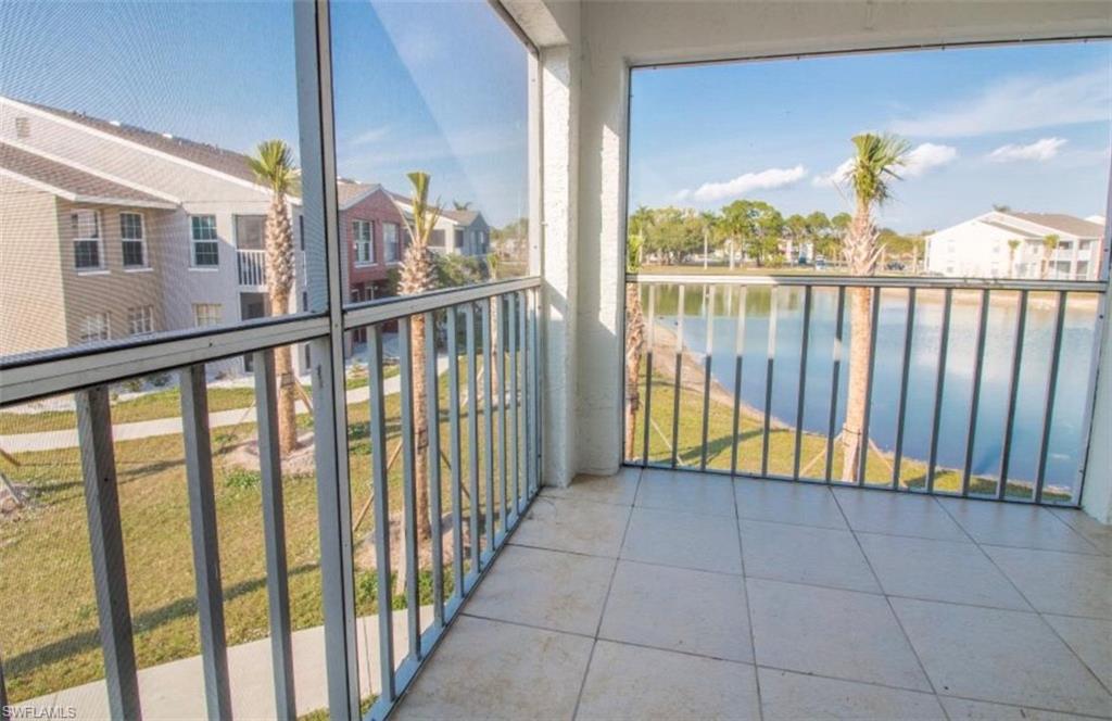 142 Santa Clara Drive, Unit 7 Naples, FL 34104 - Photo 20 of 41 Balcony with a water view and a residential view