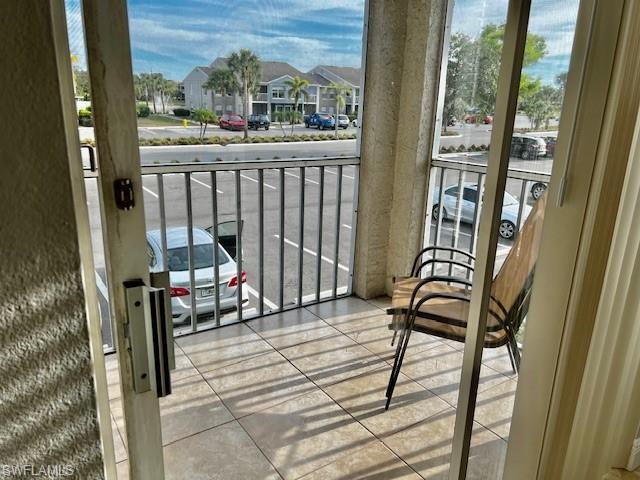 142 Santa Clara Drive, Unit 7 Naples, FL 34104 - Photo 23 of 41 Balcony with a residential view