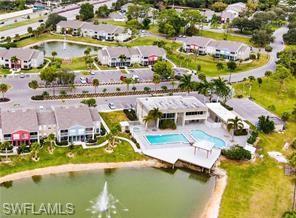 142 Santa Clara Drive, Unit 7 Naples, FL 34104 - Photo 25 of 41 Aerial view with a water view