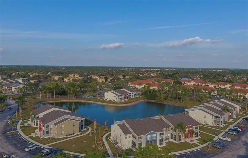 142 Santa Clara Drive, Unit 7 Naples, FL 34104 - Photo 32 of 41 Bird's eye view with a residential view and a water view