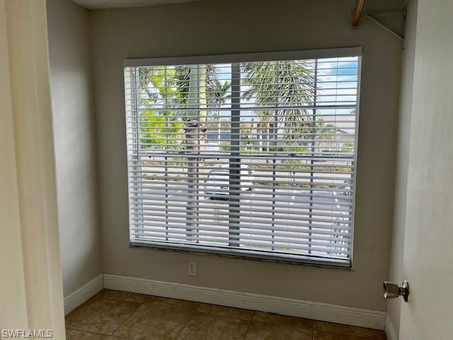 142 Santa Clara Drive, Unit 7 Naples, FL 34104 - Photo 10 of 41 Room details with baseboards