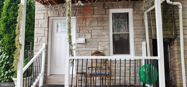 a view of a balcony with front door