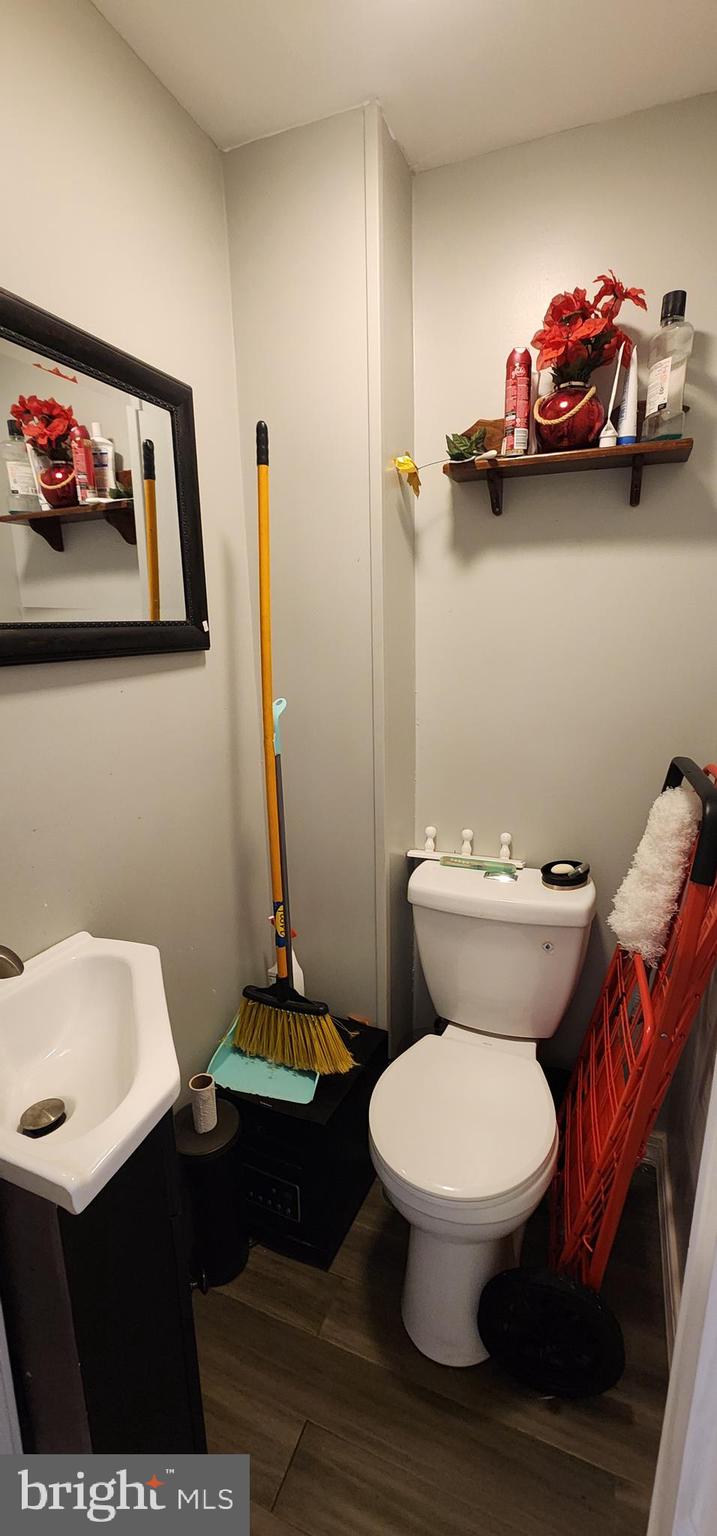 234 Orange Street Reading, PA 19602 - Photo 6 of 18 a bathroom with a toilet and a sink