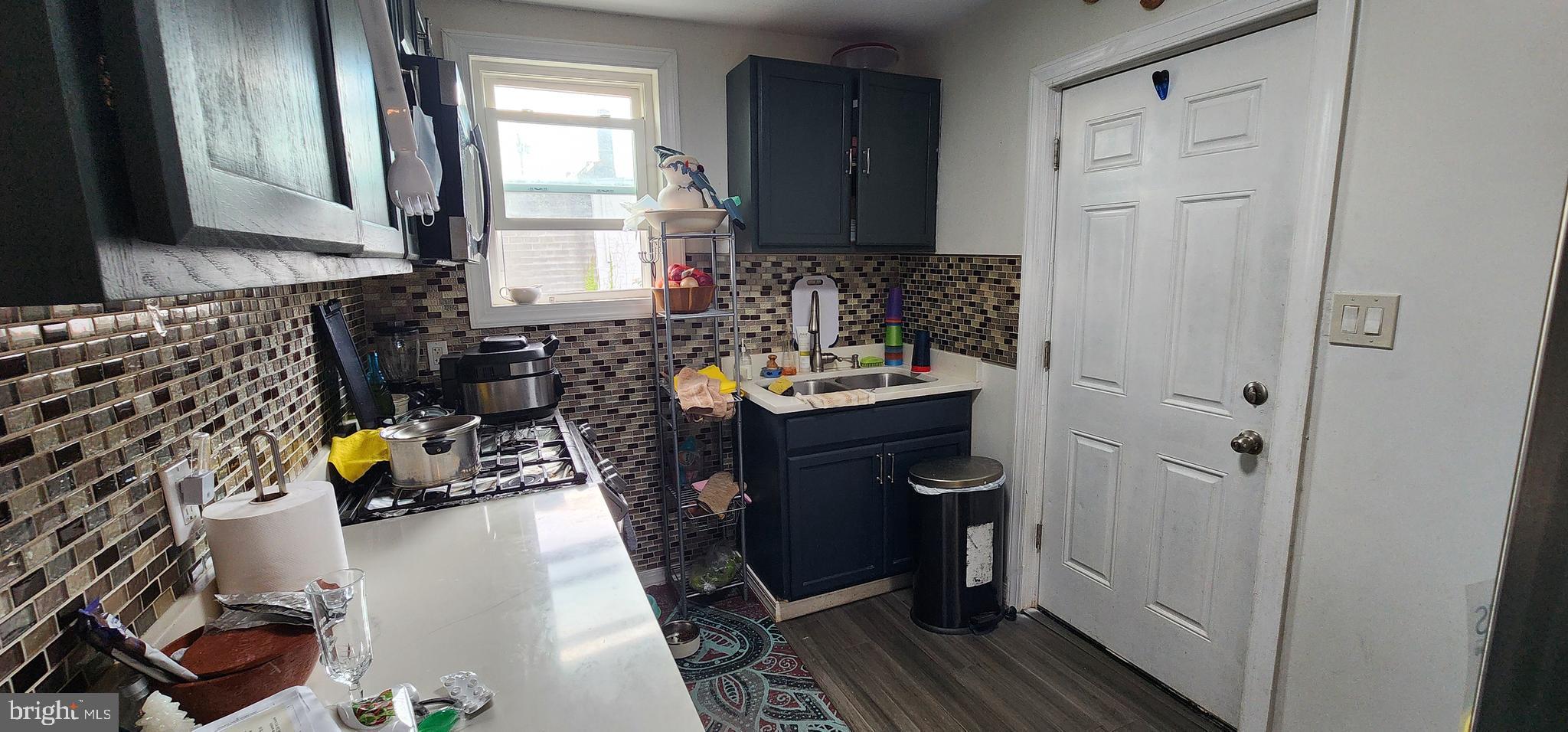 234 Orange Street Reading, PA 19602 - Photo 8 of 18 a bathroom with a sink and a mirror