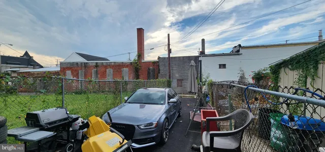 a view of a patio in backyard