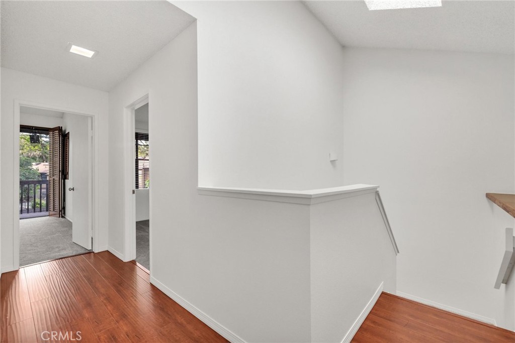 4140 Workman Mill Road, Unit 253 Whittier, CA 90601 - Photo 20 of 63 a view of hallway with wooden floor