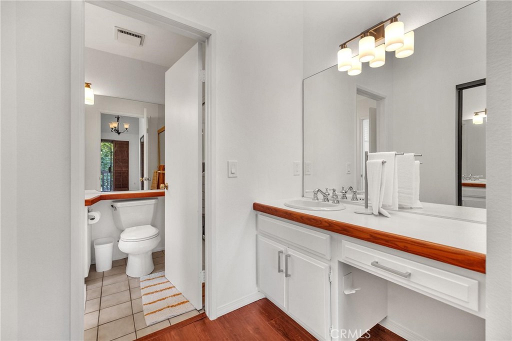 4140 Workman Mill Road, Unit 253 Whittier, CA 90601 - Photo 27 of 63 a bathroom with a sink and a mirror