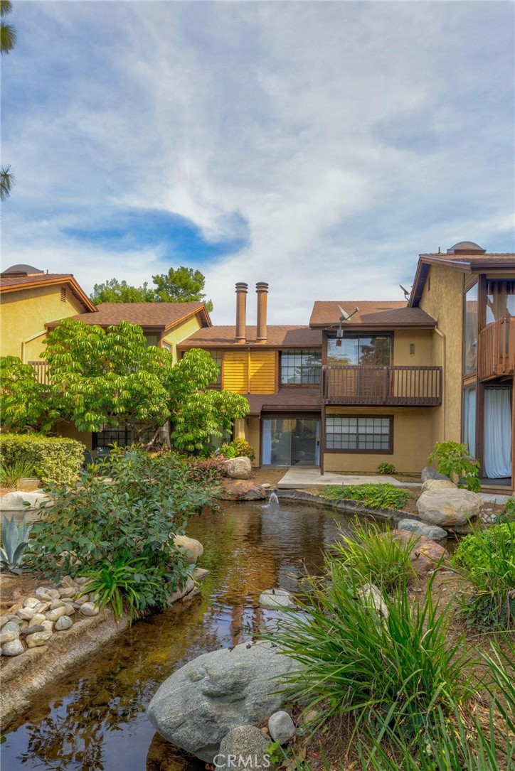 4140 Workman Mill Road, Unit 253 Whittier, CA 90601 - Photo 48 of 63 a view of a lake with a building in the background