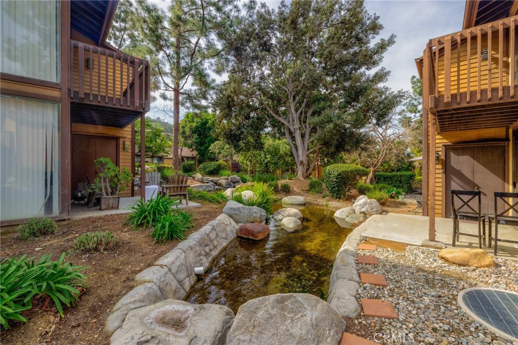 4140 Workman Mill Road, Unit 253 Whittier, CA 90601 - Photo 53 of 63 a view of a backyard with sitting area and furniture