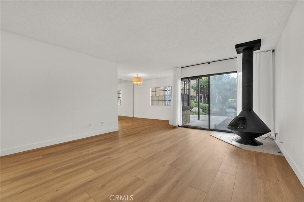 4140 Workman Mill Road, Unit 253 Whittier, CA 90601 - Photo 9 of 63 a view of an empty room and glass door