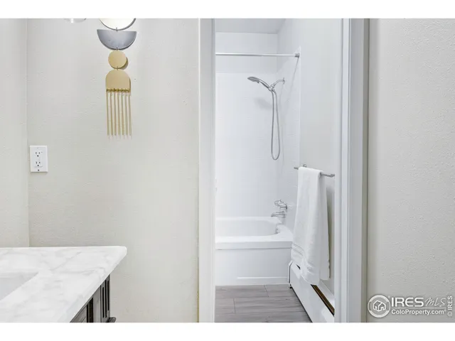 a view of a chairs and table on the deck