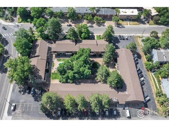 a view of a city with mountains in the background