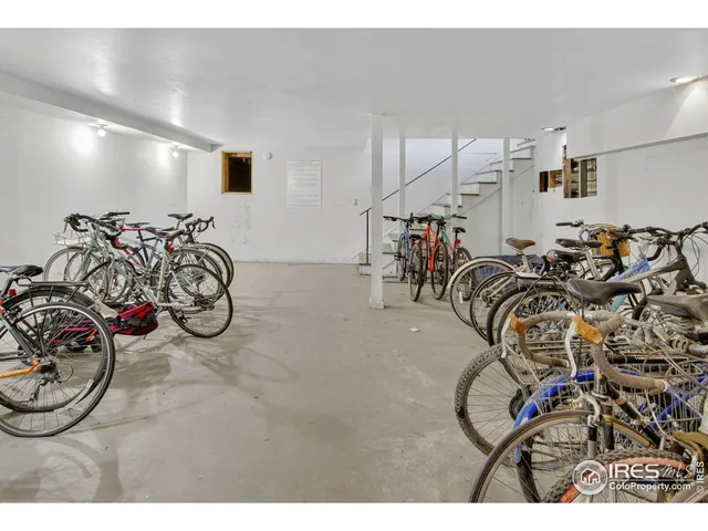 a car parked in front of house with yard