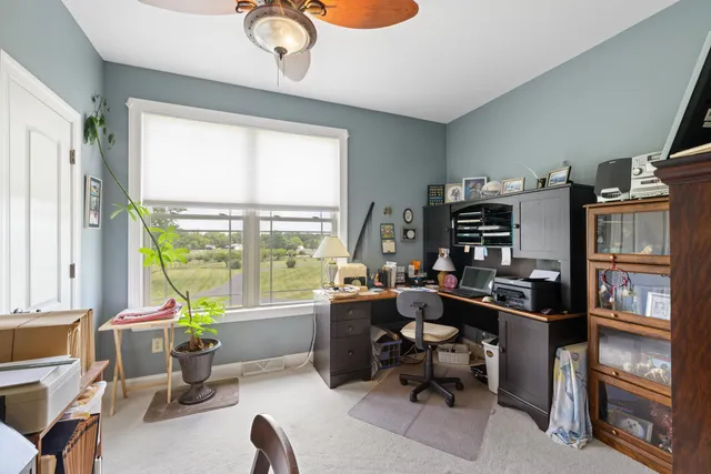 a view of washer and dryer with kitchen in the background