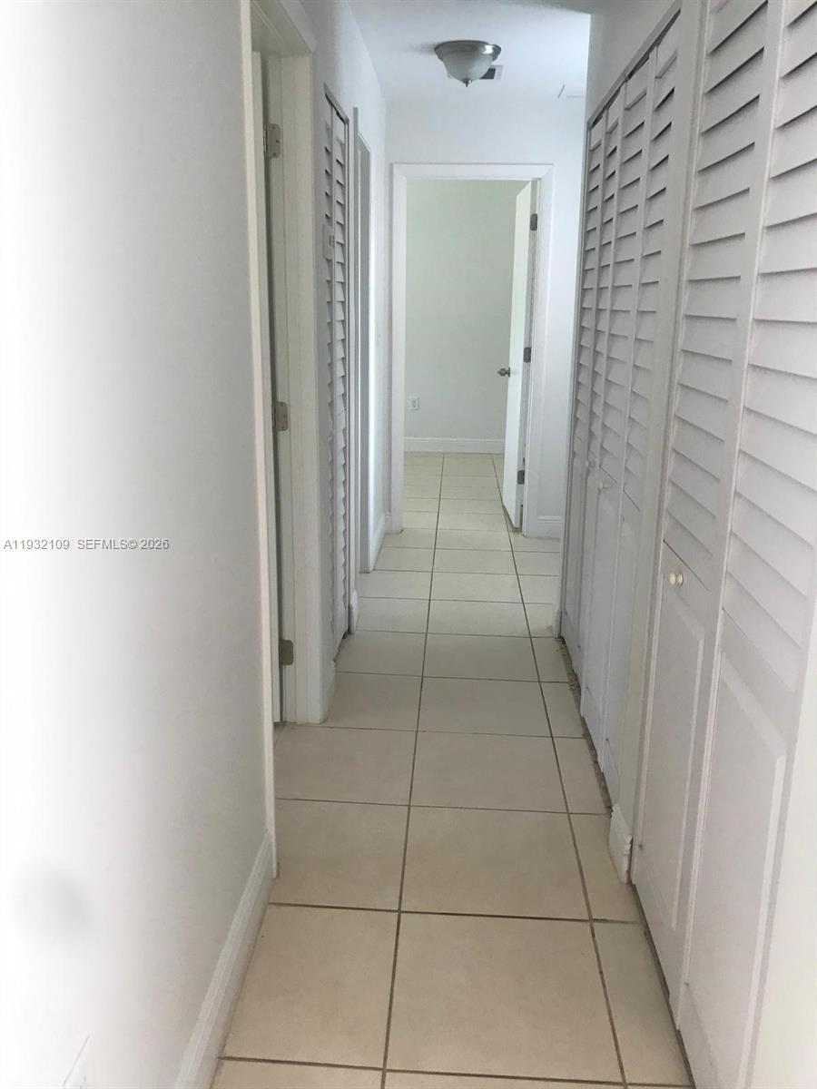 10609 Southwest 113th Place, Unit 87Z Miami, FL 33176 - Photo 12 of 21 a view of a bathroom with a sink