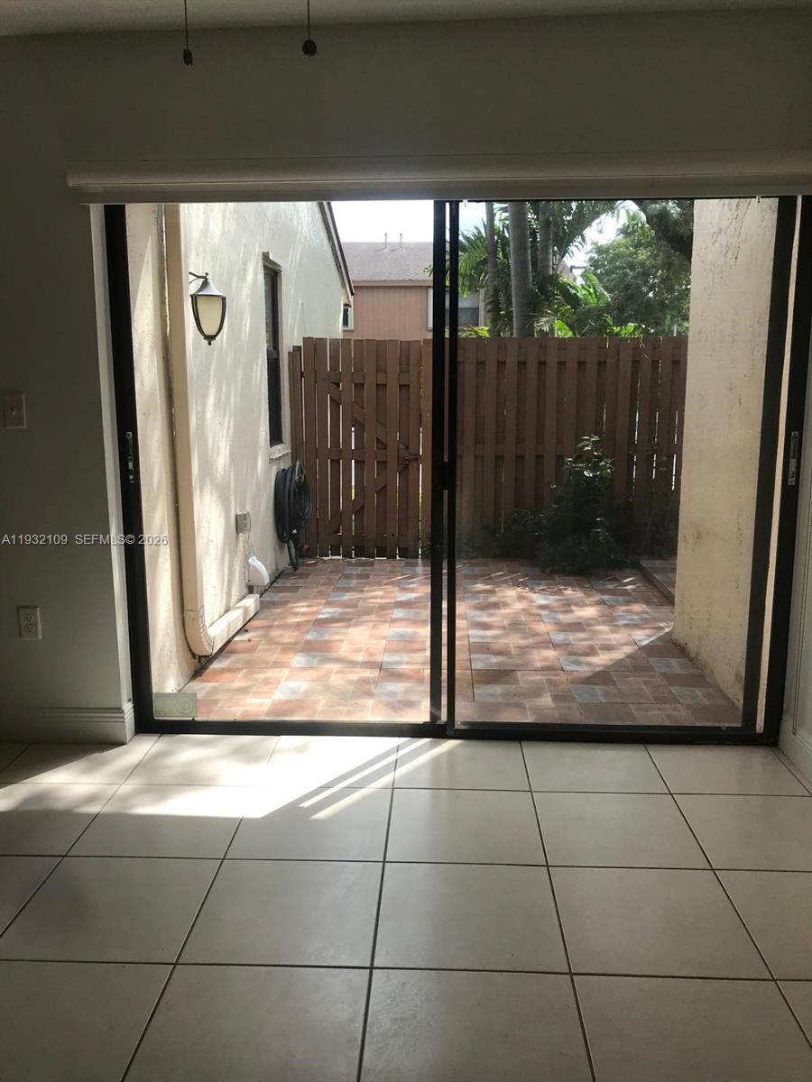 10609 Southwest 113th Place, Unit 87Z Miami, FL 33176 - Photo 15 of 21 a view of a outdoor space
