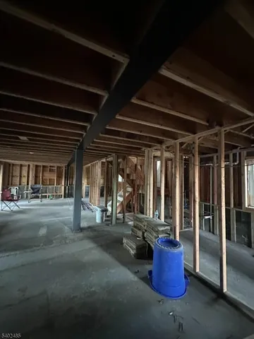 a lobby with furniture and floor to ceiling window