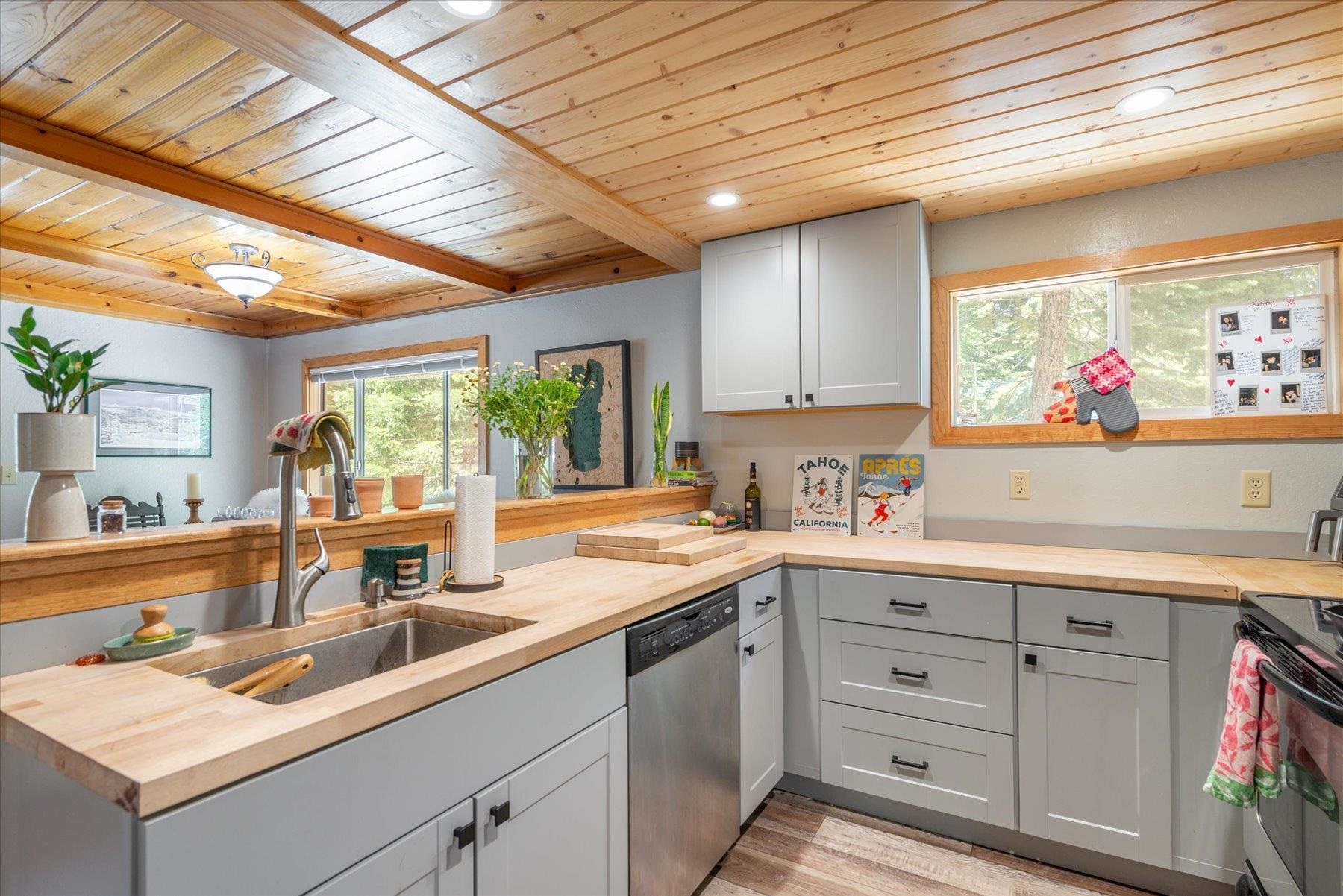 12080 Pine Forest Road Truckee, CA 96161 - Photo 13 of 20 a kitchen with a sink cabinets and window