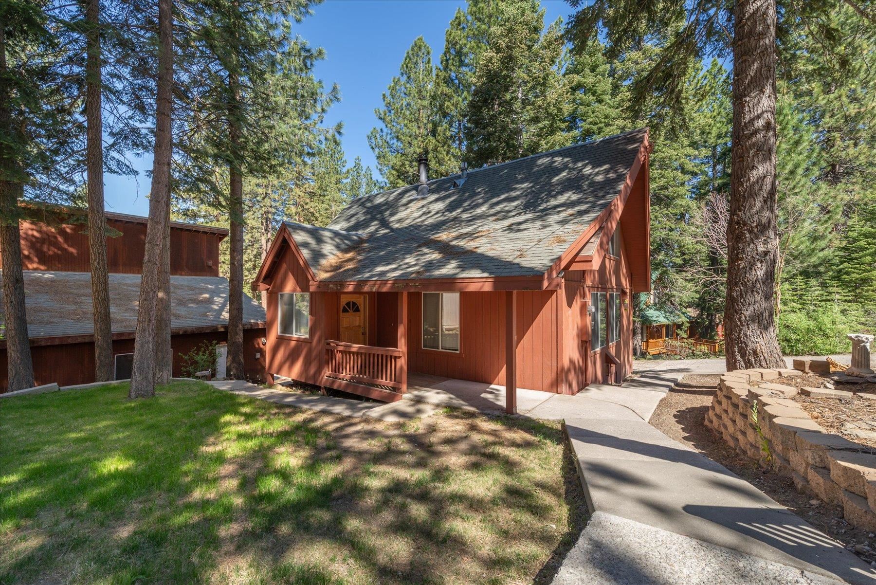 12080 Pine Forest Road Truckee, CA 96161 - Photo 2 of 20 a view of a backyard with large trees