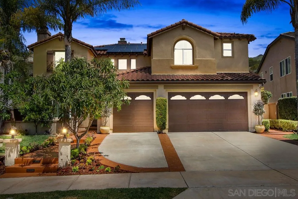16237 Cayenne Ridge Road San Diego, CA 92127 - Photo 1 of 34 a front view of a house with yard