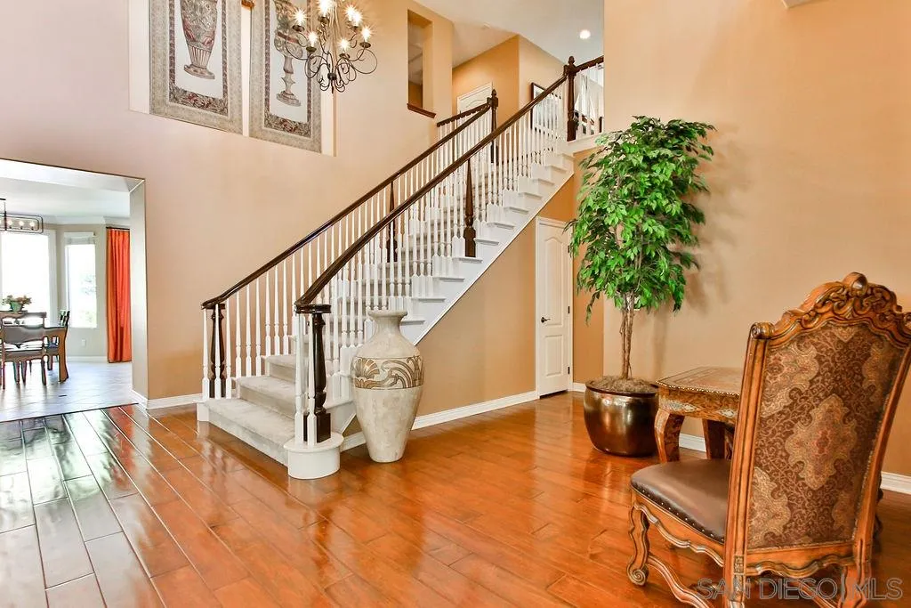 16237 Cayenne Ridge Road San Diego, CA 92127 - Photo 2 of 34 a view of entryway and hall with wooden floor
