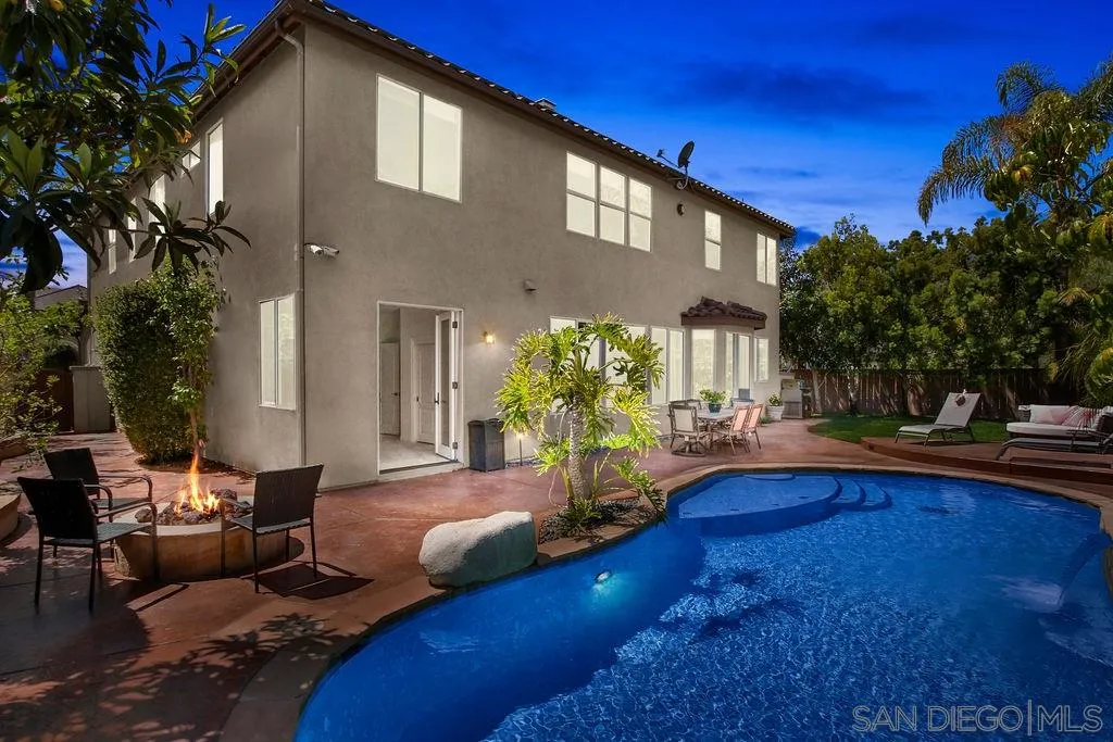 16237 Cayenne Ridge Road San Diego, CA 92127 - Photo 23 of 34 a house view with sitting space garden view with a seating space