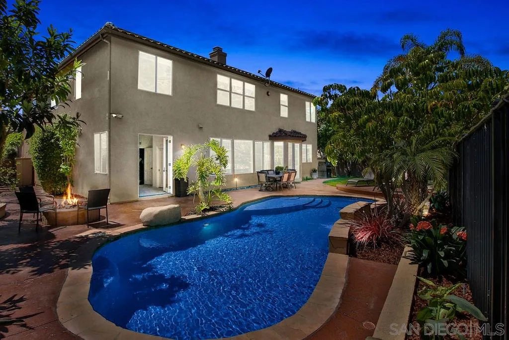 16237 Cayenne Ridge Road San Diego, CA 92127 - Photo 24 of 34 a view of a house with swimming pool and sitting area