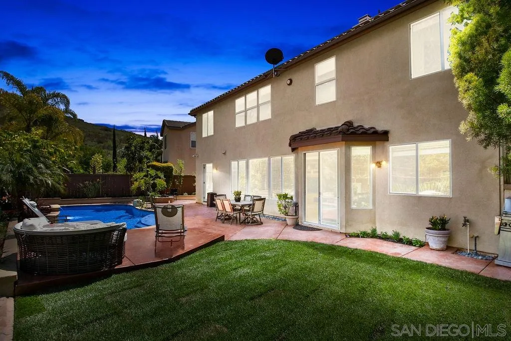 16237 Cayenne Ridge Road San Diego, CA 92127 - Photo 25 of 34 a view of a backyard with sitting area