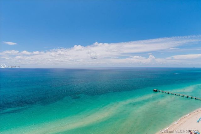 a view of a big yard of a house