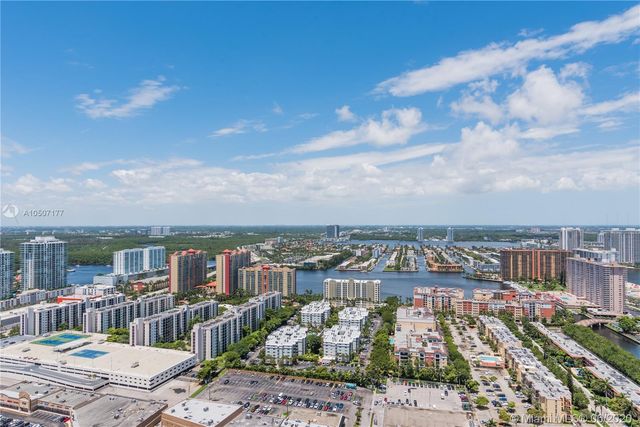 a view of a balcony with chairs