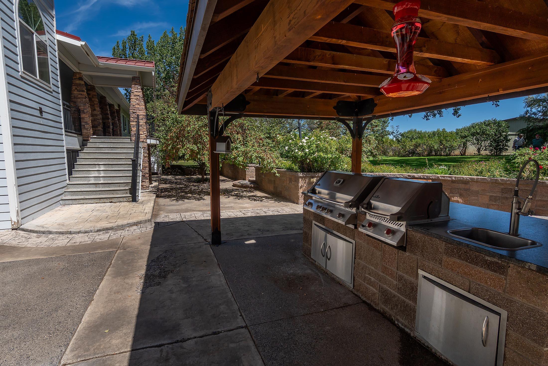 59047 Old Lake Road Christmas Valley, OR 97641 - Photo 8 of 55 Appliances and storage areas of outdoor kitchen