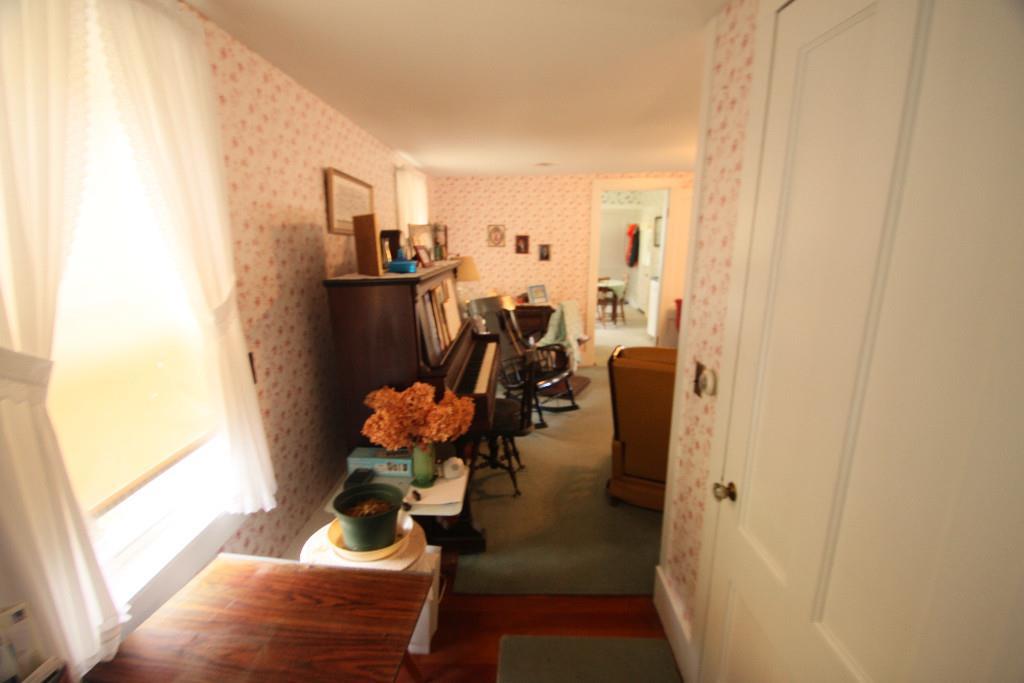 90 Bridgton Road Sebago, ME 04029 - Photo 12 of 22 Hallway looking to living room.