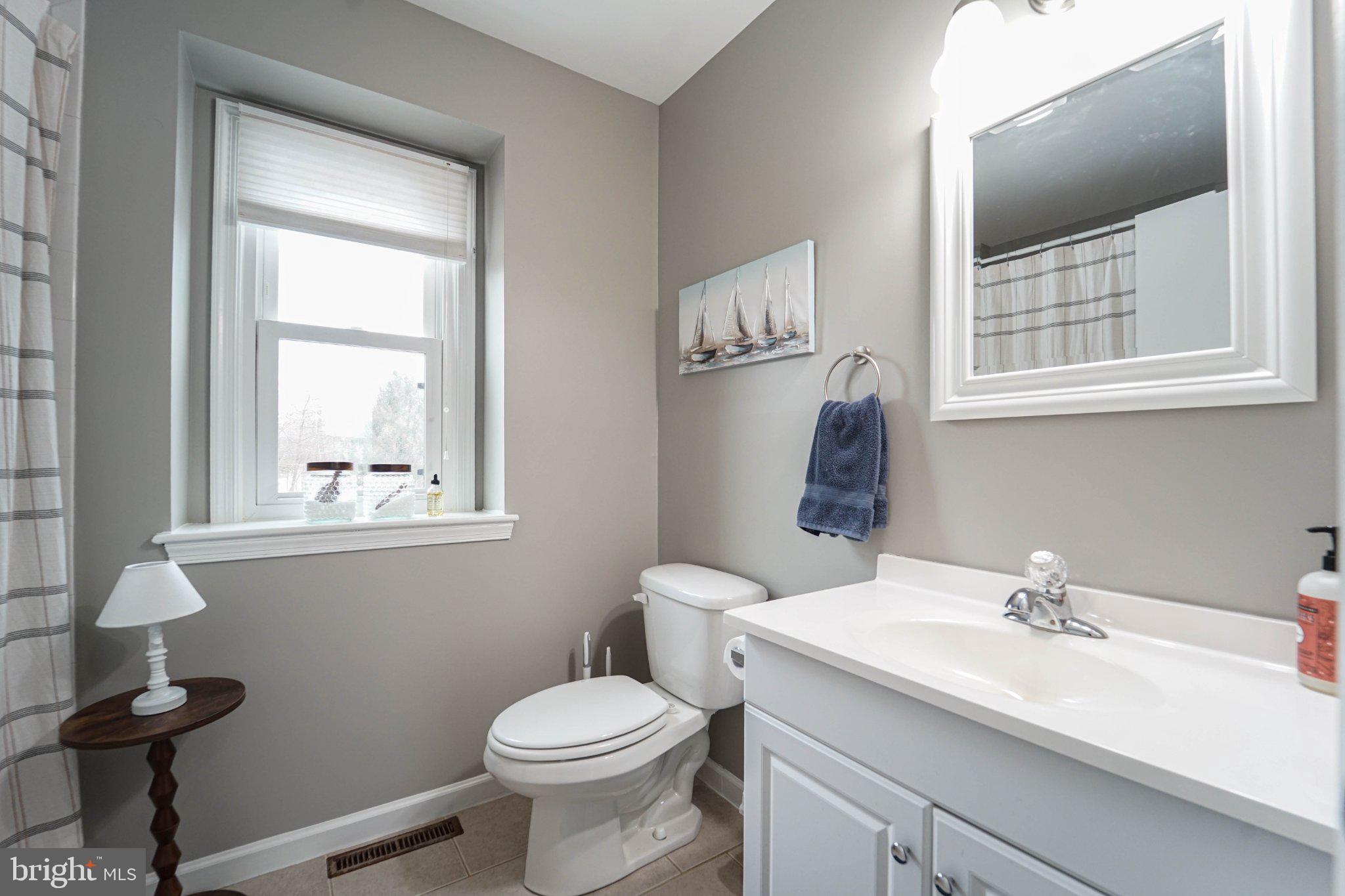 211 Queen Anne Road Stevensville, MD 21666 - Photo 26 of 33 Bright and airy bathroom retreat.