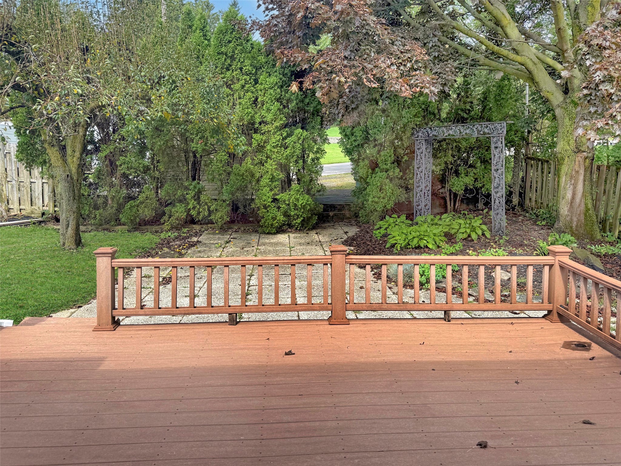1630 West Gore Road Erie, PA 16509 - Photo 48 of 50 Lower Deck. Through the Trees is the dumpster and detached shed.