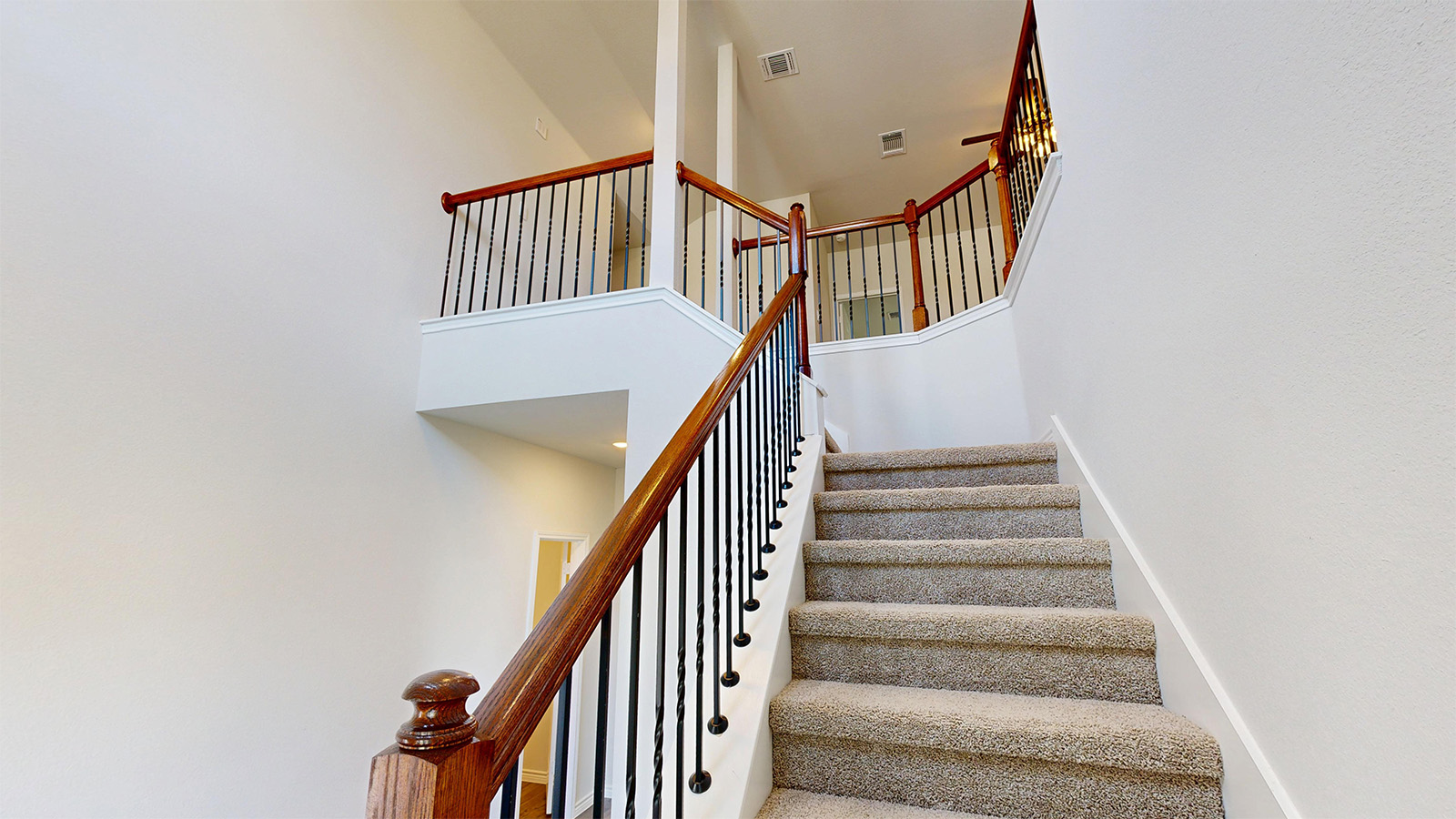 109 Megan Trail Thorndale, TX 76577 - Photo 11 of 26 Stairs with a high ceiling