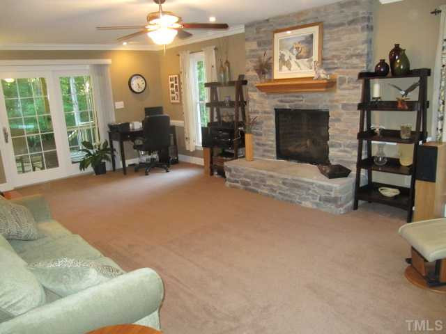 9420 Springdale Drive Raleigh, NC 27613 - Photo 2 of 25 Large Family Room with French Doors Leading to New Screened Porch