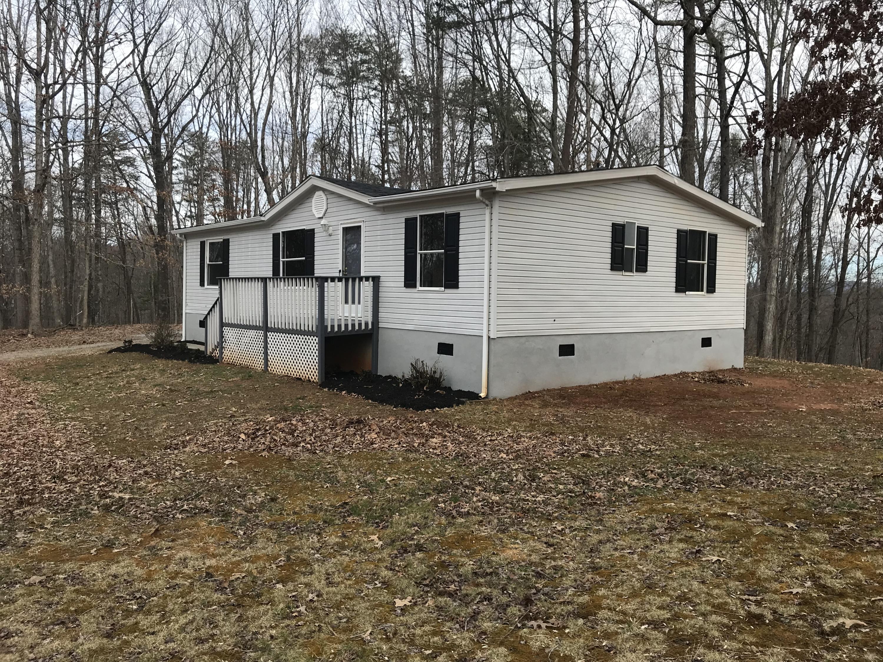 1064 Old Plantation Road Goodview, VA 24095 - Photo 2 of 10 a view of a house with a yard