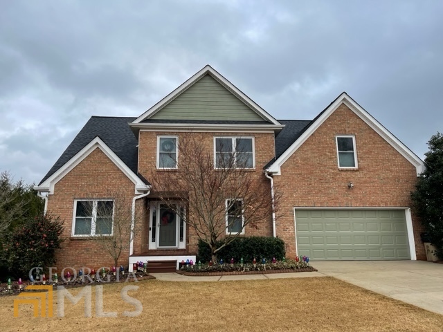4840 Haley Ridge Court Cumming, GA 30028 - Photo 1 of 1 a front view of a house with a yard
